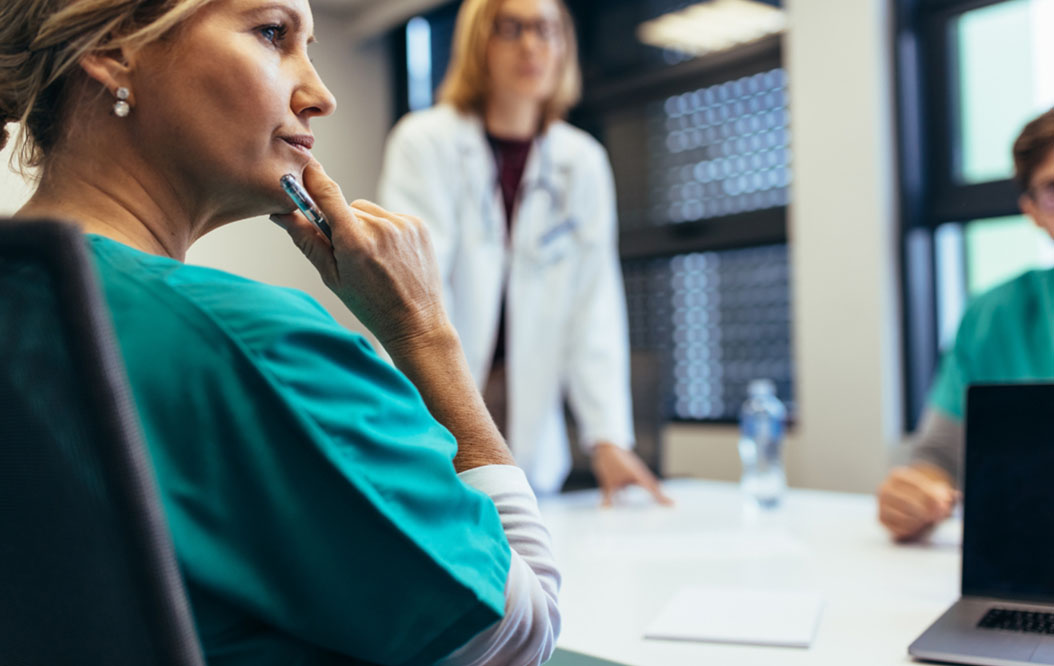 healthcare professional assisting patient